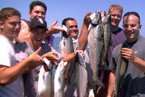 The crew from Henry's Sports & Bait Shop/Henry's Marine with a rack of Coho and King Salmon (http://www.henrysmarine.com/).