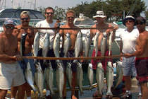 Captain Gintas with some family, friends, and a whole bunch of Kings and Cohos.